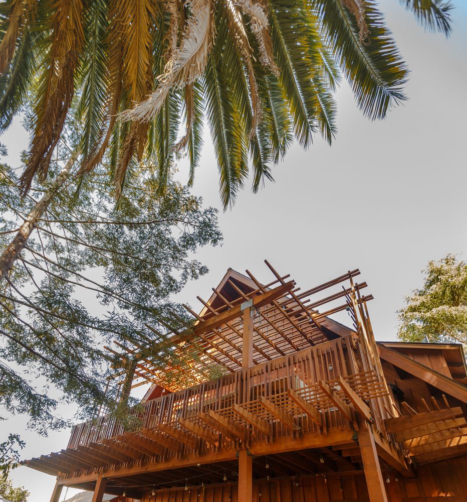 Custom deck and pergola addition built by Chinchilla Construction