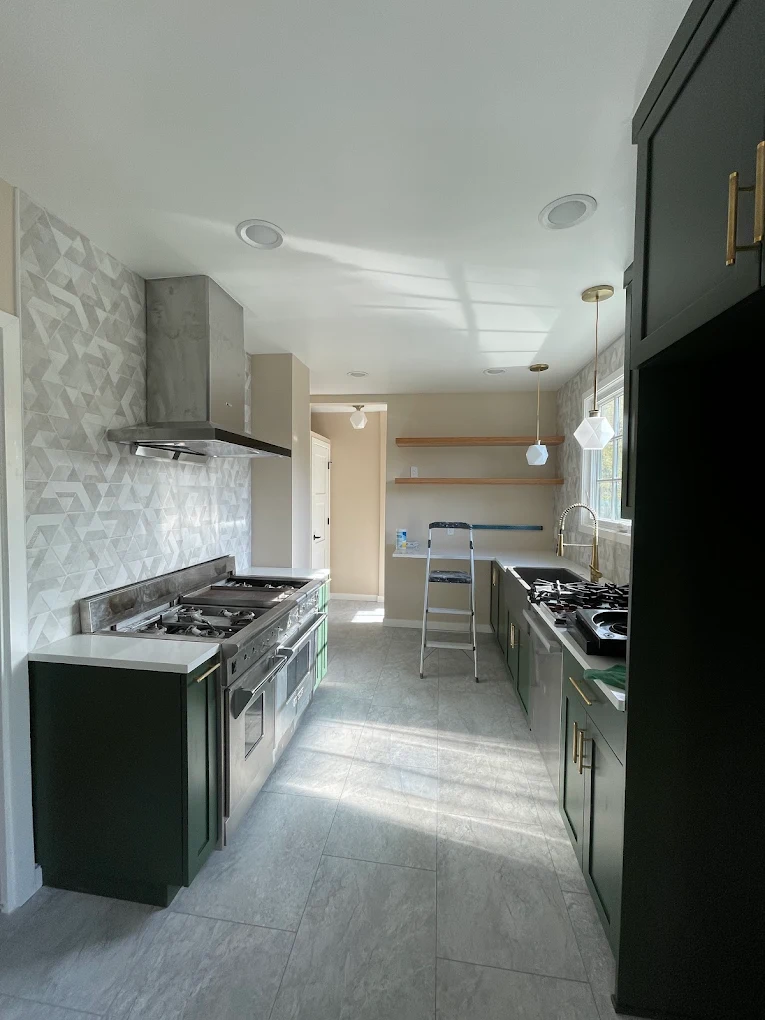 Kitchen remodel in progress, cabinetry and paint