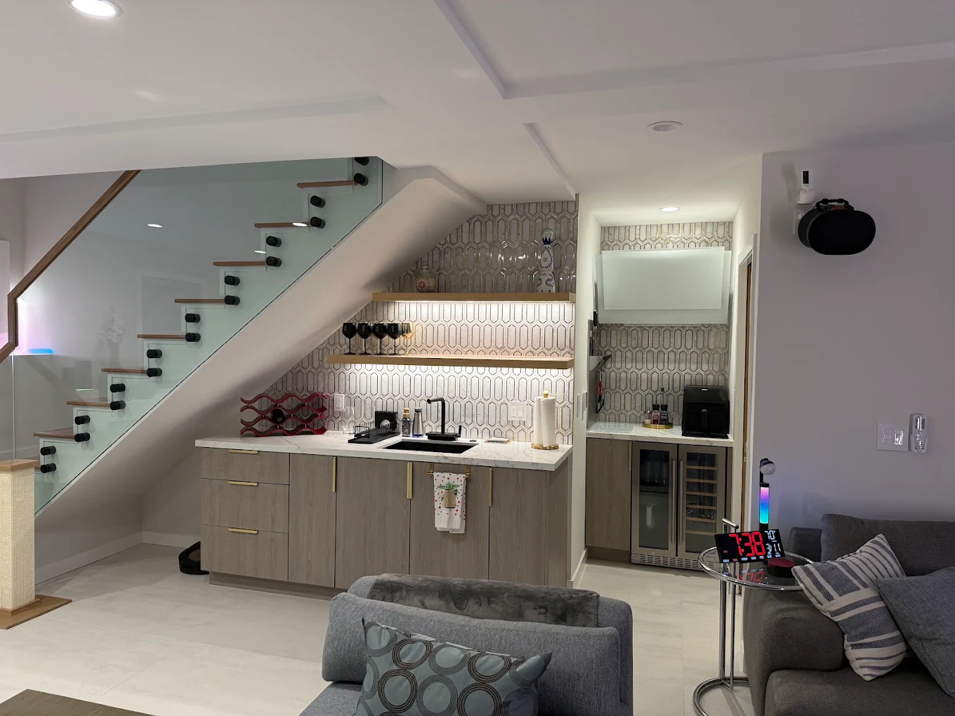 Custom wet bar built under a staircase